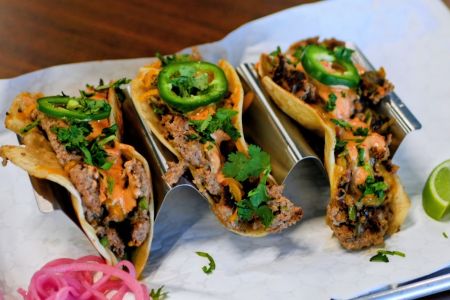 Savor the deliciousness of a barbecue bacon cheeseburger with savory sauce and fresh bun.